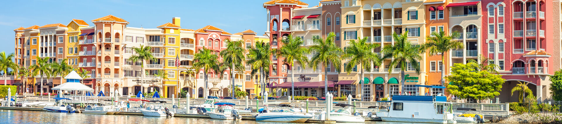 photo of boca raton shops and boat dock